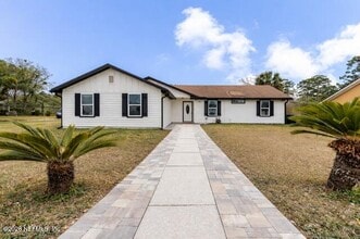 Building Photo - 10036 Delano Dr N