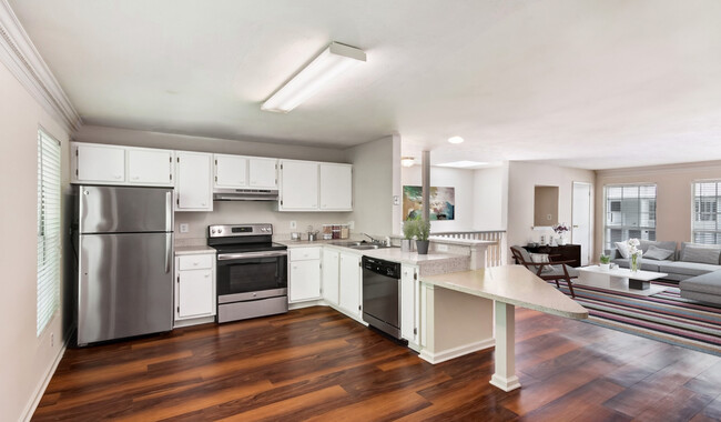 Open concept layouts with large kitchens and living rooms - Peachtree Park Apartments