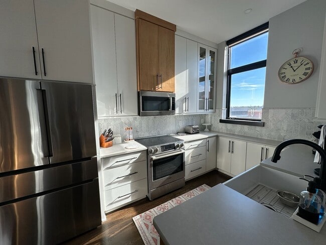 Building Photo - Beautiful 1 Bedroom 1.5 Bath Condo in down...