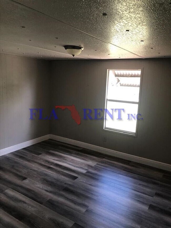 Building Photo - Coming Soon....3/2 Manufactured home with fenced in yard/ Bithlo area