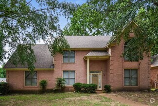Building Photo - 8664 Meadow Green Dr