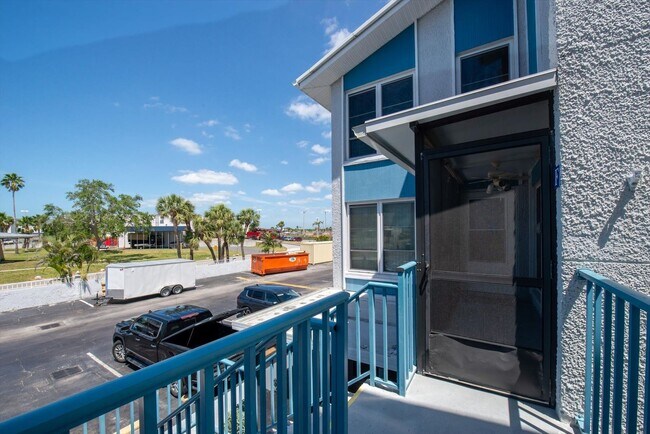 Building Photo - Gated Waterfront Community  1-Bedroom 1.5 ...
