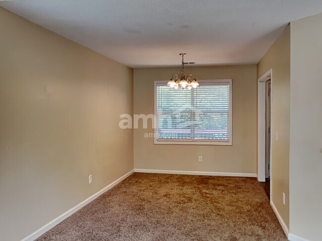 Building Photo - 1021 Whispering Woods Dr