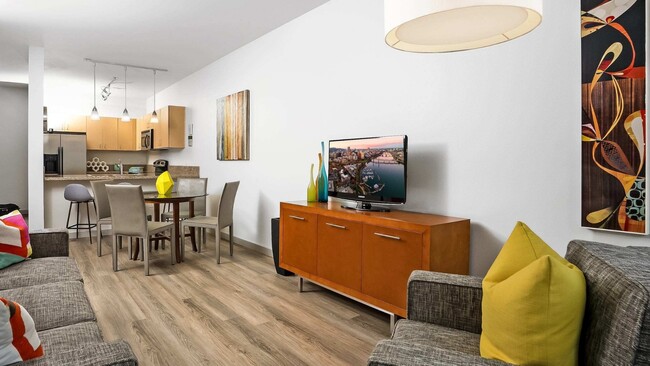 Open-concept apartments with modern kitchens and spacious living areas - The Matisse