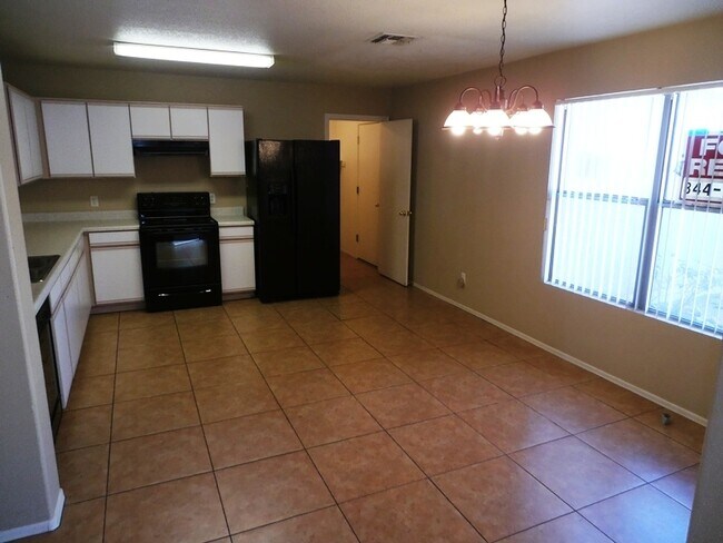 Building Photo - Midvale Park Home with 4 bedrooms and 2 baths