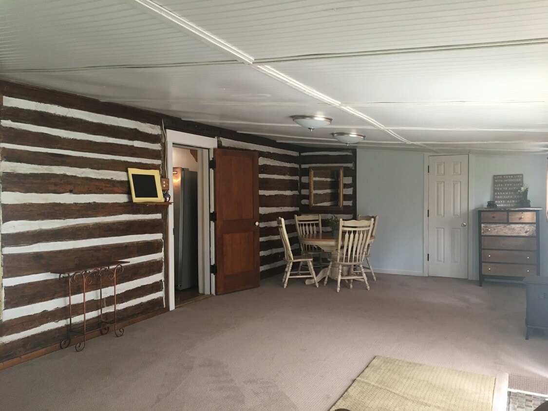 Large living area off the kitchen could be used as a fourth bedroom. - 4949 Buena Vista Pike