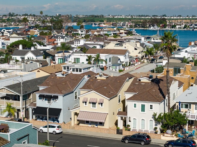 Building Photo - "Coastal Tommy Bahama at 208 East Balboa: Fully Furnished 3-Bed Sanctuary with Rooftop Deck