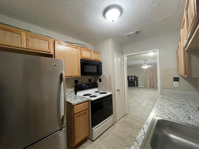 Building Photo - 8323 Wilcrest Dr
