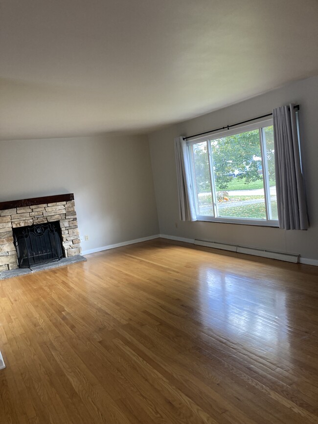 Living room with stone fireplace - 3065 Shelley Lynn Dr