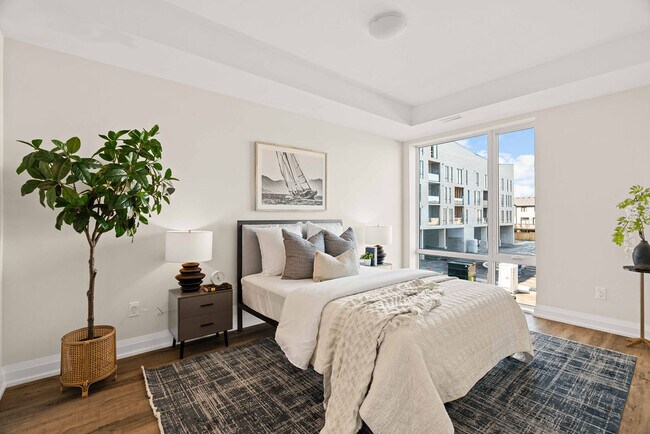 Photo du bâtiment - Executive Townhomes 2 Bed + Den