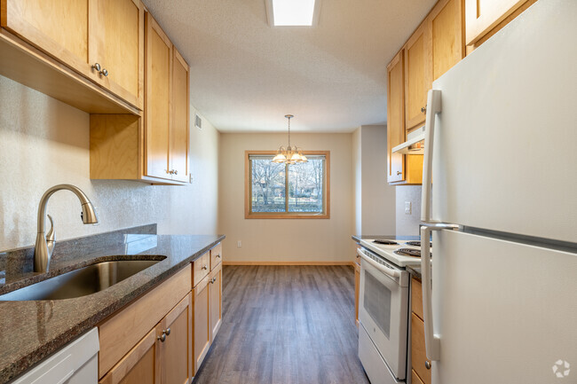 2BR, 1.5BA - 1,015SF - Kitchen - Larpenteur Estates