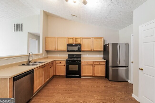 Foto del edificio - 3110 Cooper Woods Dr