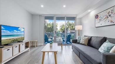 Building Photo - 19370 Collins Ave