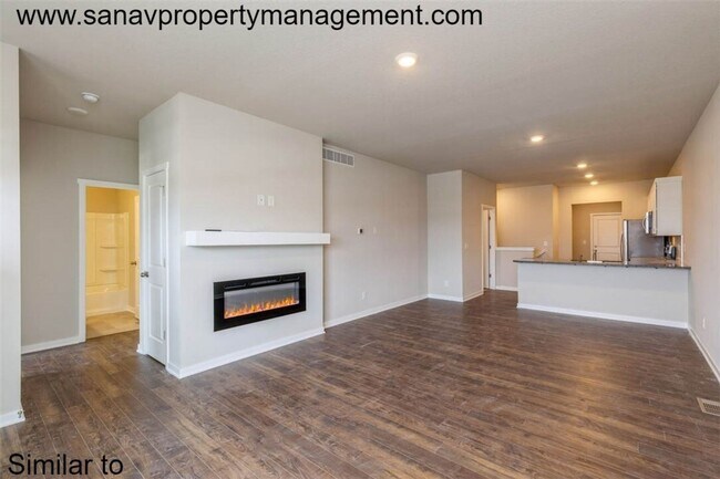 Foto del edificio - Modern Charm: 2-Bedroom, 2-Bathroom Home with Open Floor Plan and Rear Load Garage