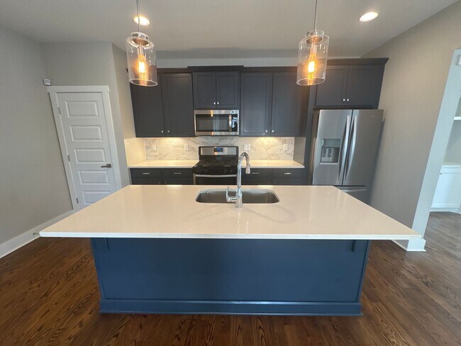 Building Photo - Newer Construction with Open Floor Plan in...