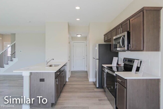 Building Photo - 3 br, 2.5 bath Townhome - Park Side Villas...