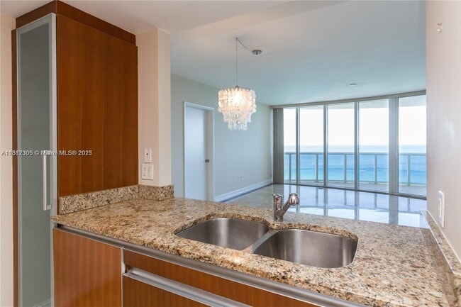 Building Photo - 17201 Collins Ave