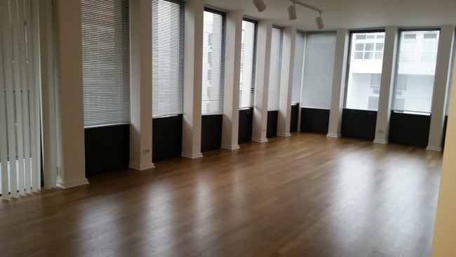 large sunny living / dining room - 1230 N State Pky