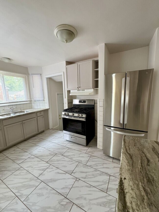 Building Photo - Must see FOUR bedroom Bungalow home