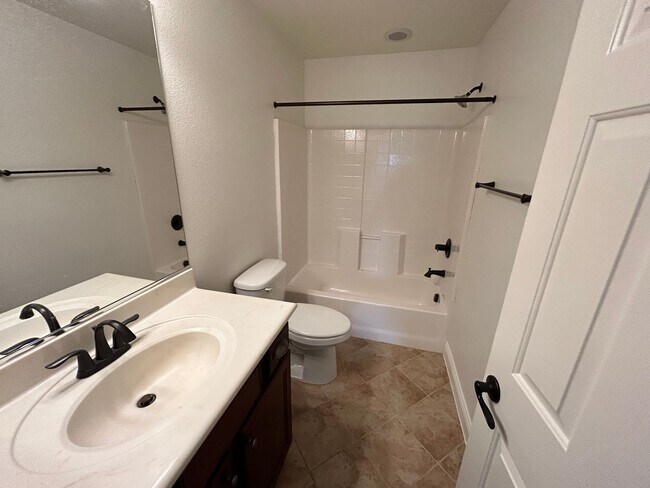 Building Photo - 5 bedroom, 4 bathroom home located across ...