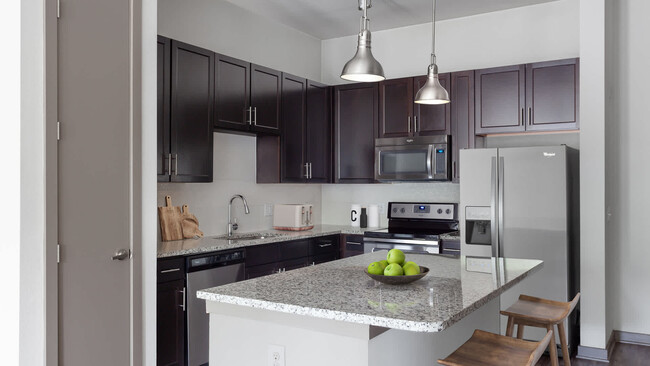 Kitchen with Stainless Steel Appliances - Crest at Park Central