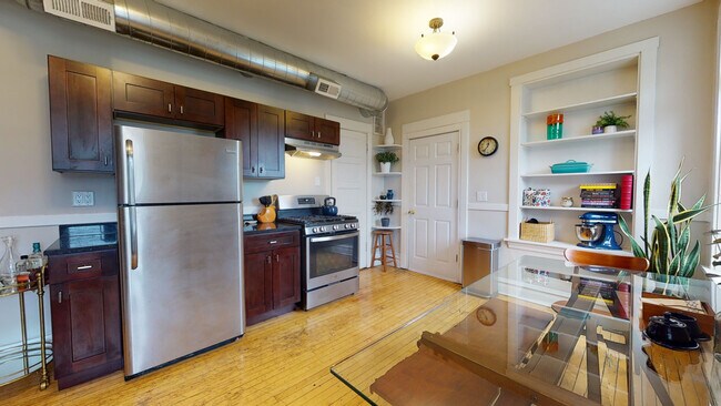 Building Photo - 1257 W Schubert Ave