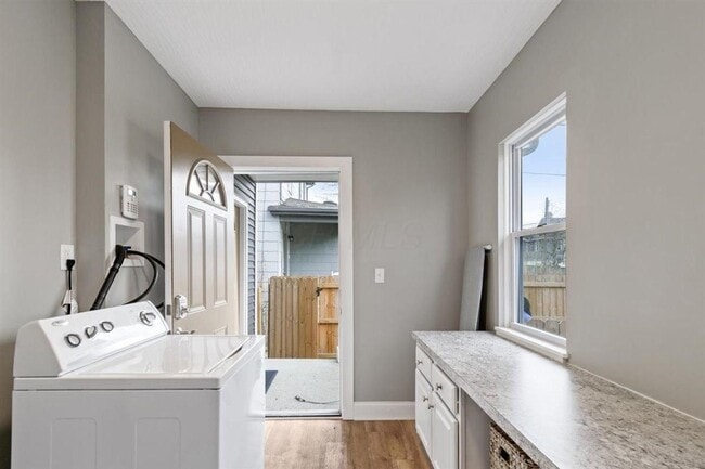 Building Photo - Modernized 2nd Floor Apartment in Franklinton – Your Urban Oasis Awaits!