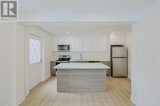 Building Photo - 100 Liberty St N