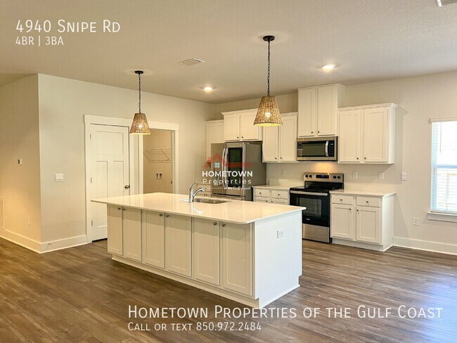 Foto del edificio - Spacious 4-Bedroom Haven with 3 Full Baths...