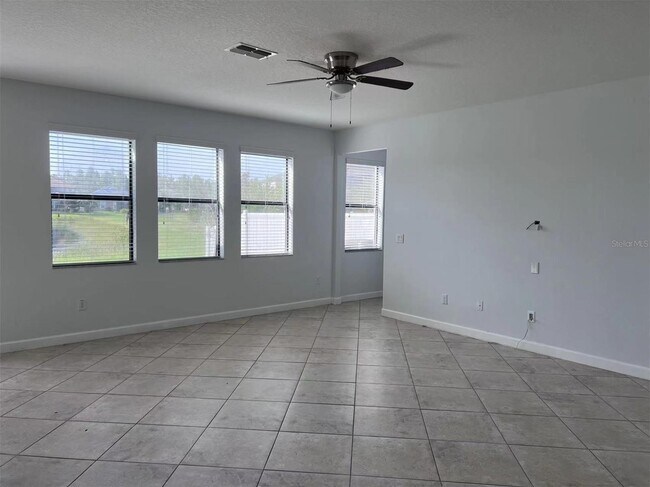 Building Photo - "Spacious 5-Bed Retreat with Elegant Hardw...