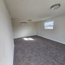 Building Photo - Unit 1/4 All Utilities Included