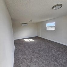 Building Photo - Unit 1/4 All Utilities Included
