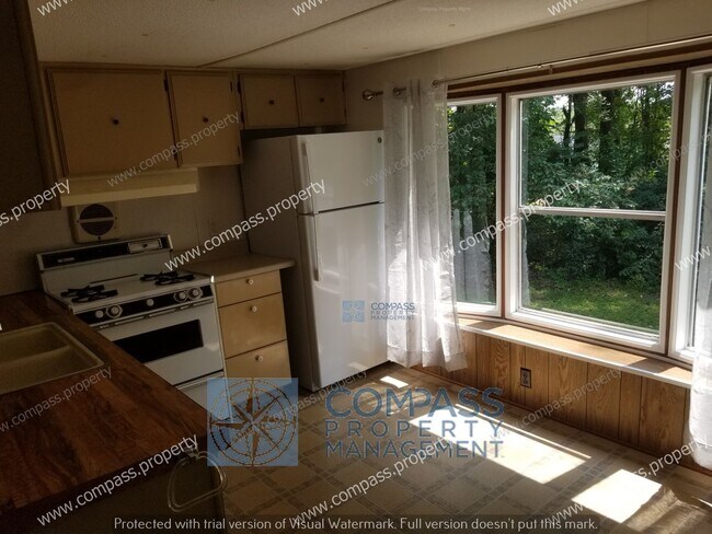 Building Photo - $1195 Singlewide with deck and yard