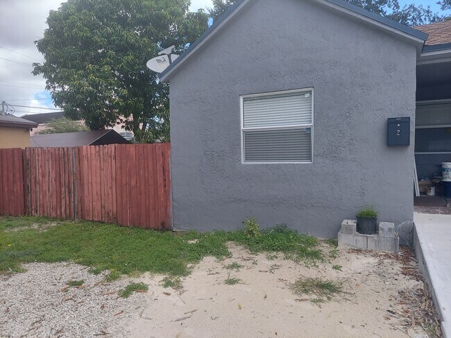 Unit 2 Front - 5573 NW 32nd Ave Apartments