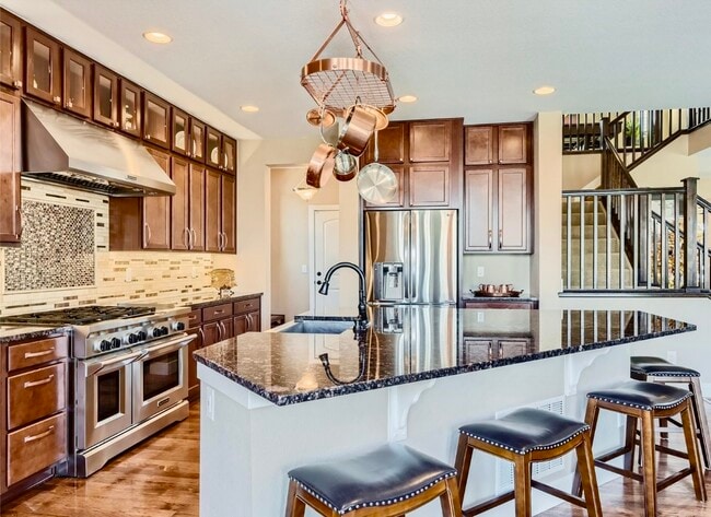6 burner gas stove/double oven - 15705 Red Deer Dr