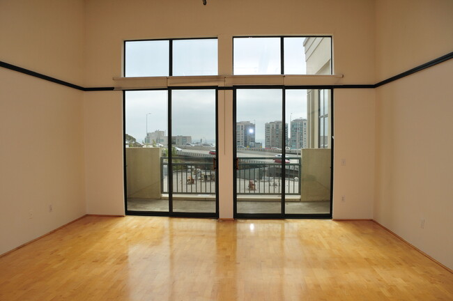 Living Room leads out to Balcony - 81 Lansing St