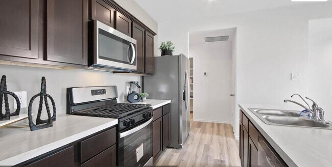 Building Photo - 23823 Desert Peach Dr