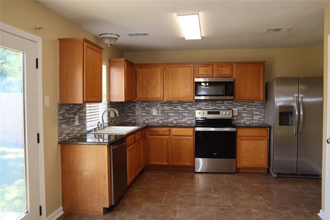 Building Photo - 11735 Rolling Stream Dr