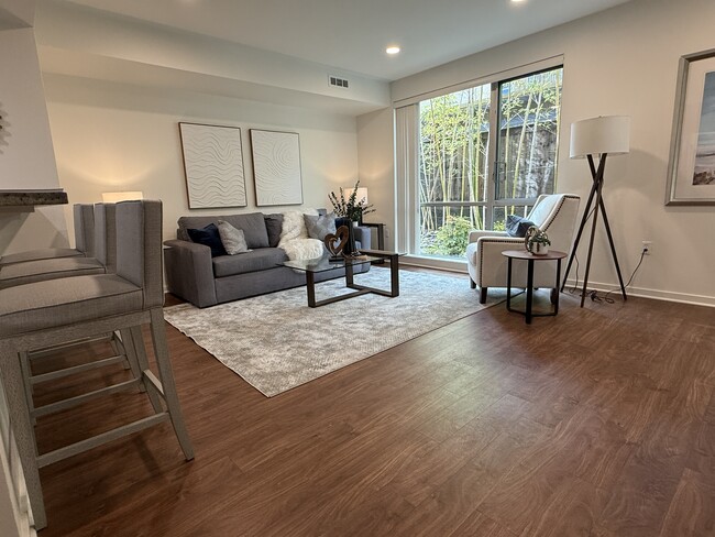 A roomy and inviting living room. - 1655 N California Blvd