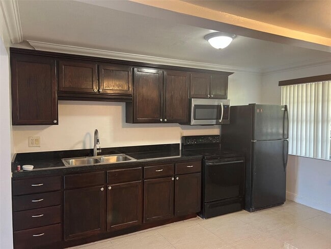 Foto del edificio - 3120 N Pine Island Rd