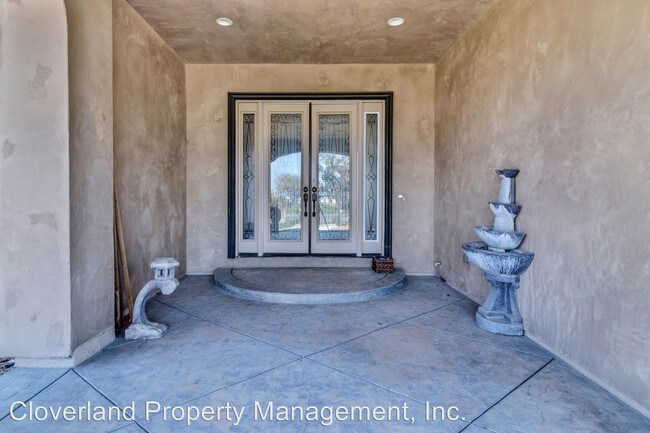 Building Photo - 5 br, 3.5 bath House - 5590 W. Grant Line Rd.