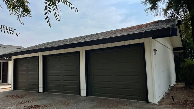 Garage building. 101’s the leftmost garage - 6330 N Fresno St