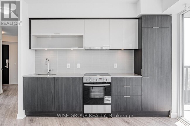 Photo du bâtiment - 159 Wellesley St E