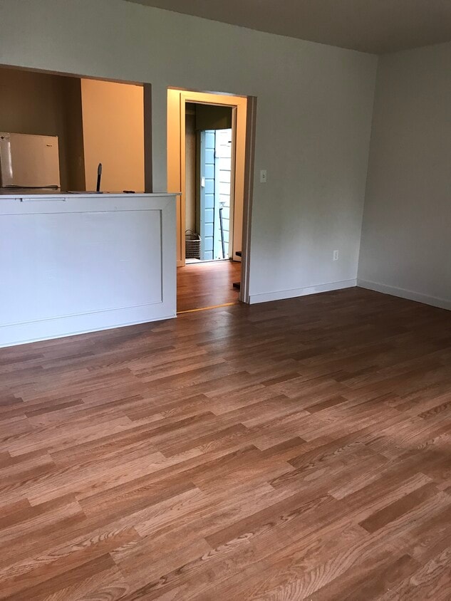 Living room facing front door - 677 46th Ave