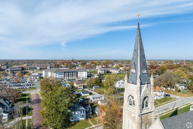 A historic church spire towers over Central Davenport.