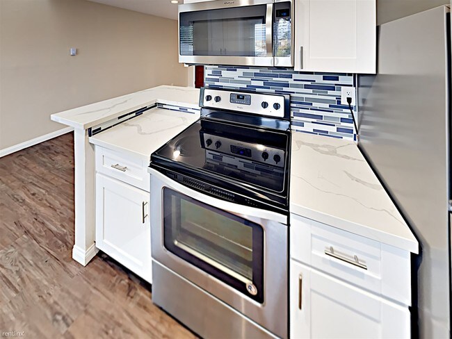 Building Photo - 1 br, 1 bath Apartment - 4514 52nd St Apt 5