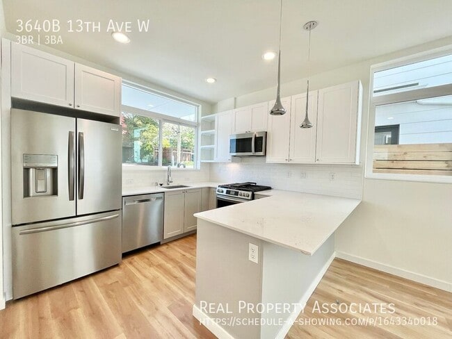 Building Photo - 3640B 13th Ave W-