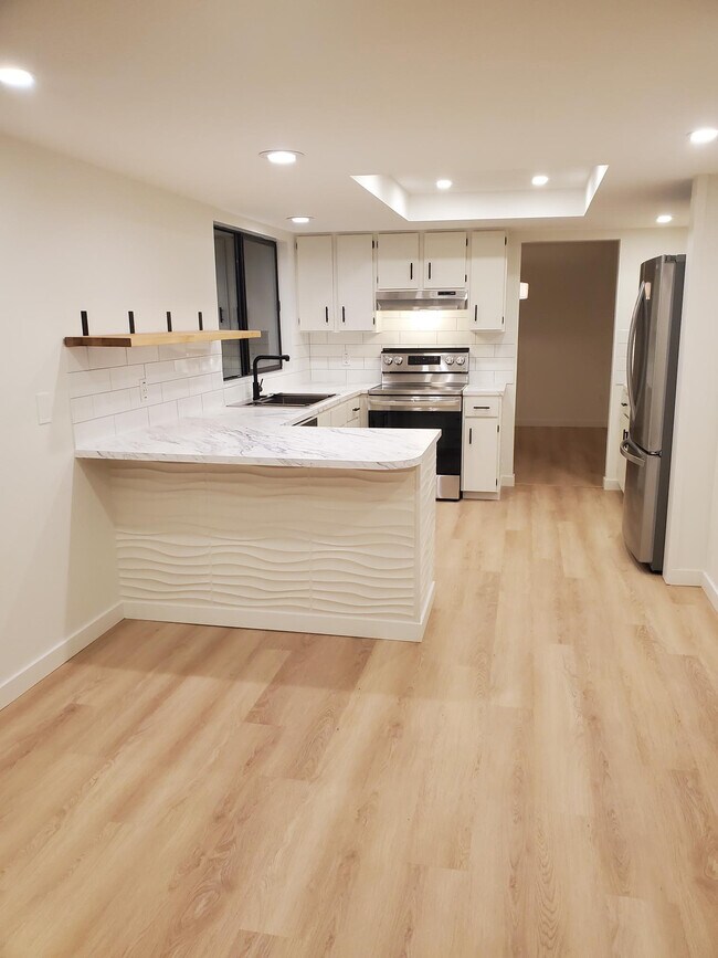 breakfast nook and kitchen - 13469 NW Spirit Ct W