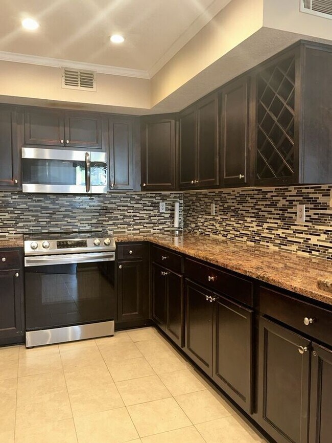 Foto del edificio - THE TRIAD TOWNHOMES IN CARROLLWOOD