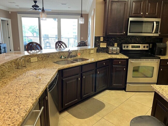 Building Photo - Modern Downtown Auburn Condo – Perfect for...
